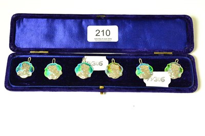 Lot 210 - A set of six Art Nouveau enamel and silver buttons