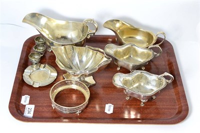 Lot 234 - A group of silver including a George III, Peter & Anne Bateman swing handled sugar bowl, London...