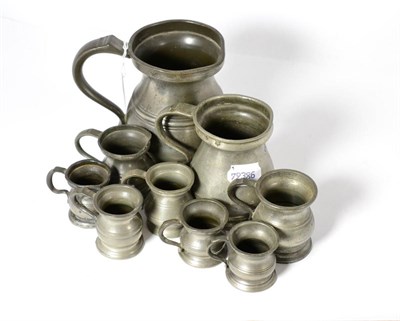 Lot 249 - A group of nine 18th century and later pewter tankards and miniature tankards