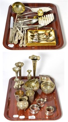 Lot 254 - A quantity of Continental and English silver and white metal including weighted bud vases, beakers