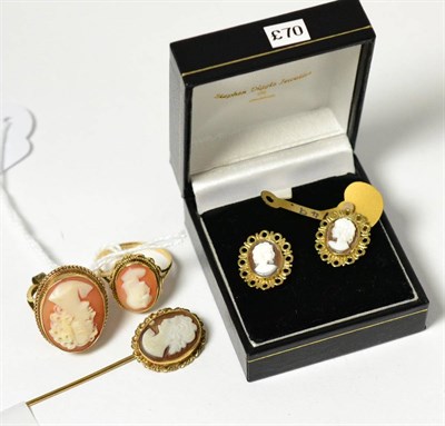 Lot 307 - Two 9ct gold cameo rings, a pair of cameo earrings and a cameo stick pin