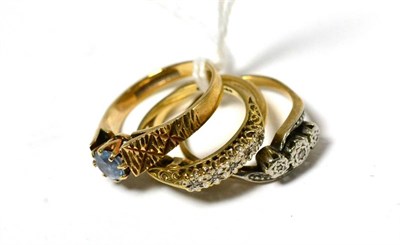 Lot 312 - A group of four gem set 9ct gold rings