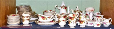 Lot 328 - A quantity of assorted Royal Albert Country Roses pattern tea and dinner wares, Royal Crown...