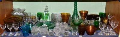 Lot 337 - A quantity of glassware including plates, wine glasses, decanters, etc (one shelf)