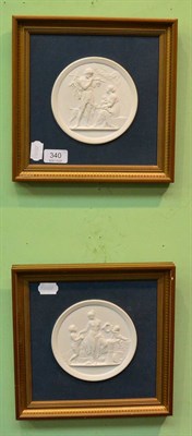 Lot 340 - Two Royal Copenhagen bisque circular plaques of Classical design, in frames