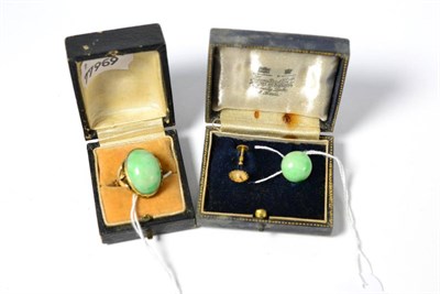 Lot 359 - A jade ring and matching earrings