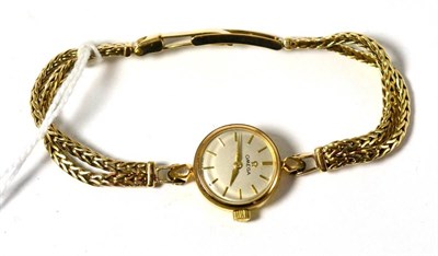 Lot 363 - A lady's plated wristwatch, signed Omega, on a later 9ct gold bracelet