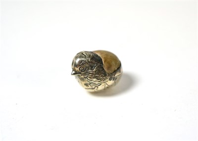 Lot 372 - A Victorian silver pin cushion in the form of a chick emerging from an egg