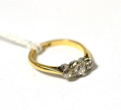 Lot 374 - A three stone diamond ring