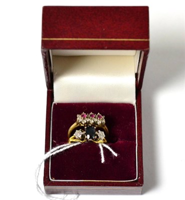 Lot 387 - An 18ct gold sapphire and diamond ring together with a 9ct gold gem set ring (2)