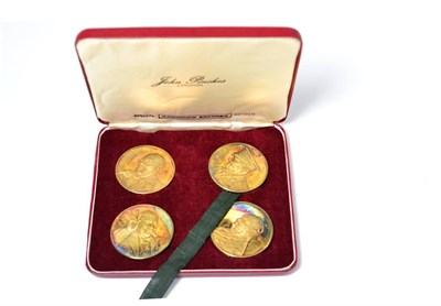 Lot 398 - Four silver gilt Churchill medallions by John Pinches