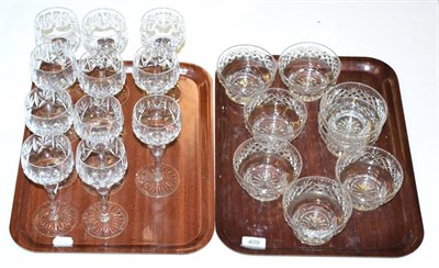 Lot 409 - Eleven cut glass hock glasses and eight cut glass sundae dishes (on two trays)