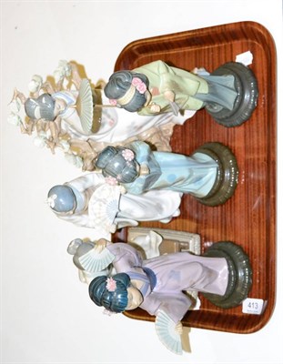 Lot 413 - A group of five Lladro geisha girls and a Nao geisha girl