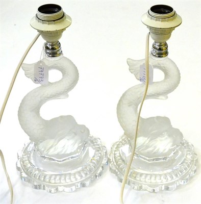 Lot 421 - A pair of Baccarat decorative dolphin glass table lamps