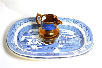 Lot 426 - Two blue and white meat plates and a copper lustre jug