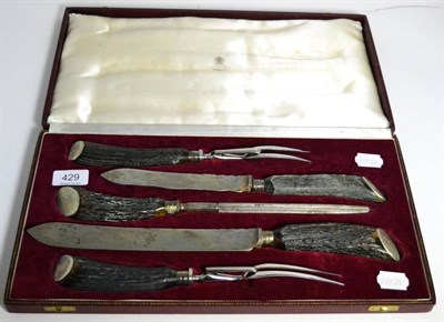 Lot 429 - A five piece antler handled carving set, Asprey & Co, engraved with a crest