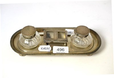 Lot 496 - A silver inkwell desk tidy and a modern silver letter knife