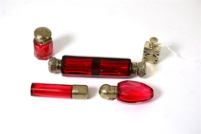 Lot 503 - A Victorian silver mounted ruby glass double ended scent bottle, three silver mounted ruby...