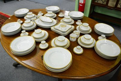 Lot 525 - A part gilt highlighted white glazed dinner and tea service