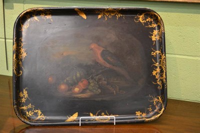 Lot 531 - A Victorian painted and gilded papier mâché tray decorated with a bird and fruit