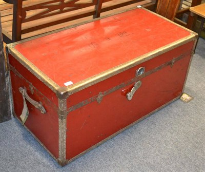 Lot 1043 - A vintage red trunk