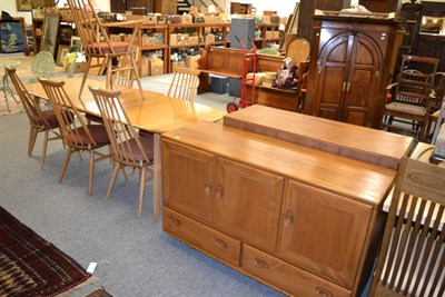 Lot 1099 - Ercol table, six chairs and two sideboards