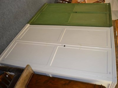 Lot 1111 - Two small painted cupboards, in green and in white