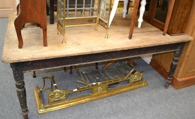 Lot 1114 - A brass fender, mesh guard and fire tools