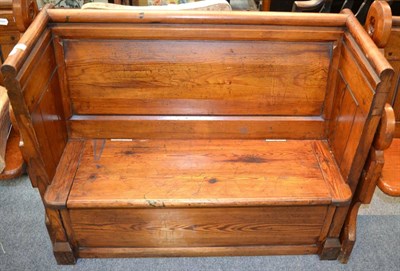 Lot 1137 - A pitch pine box settle