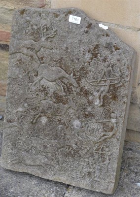 Lot 1161 - A carved stone plaque depicting a primitive hunting scene, 41cm wide, 58cm high, 7.5cm deep