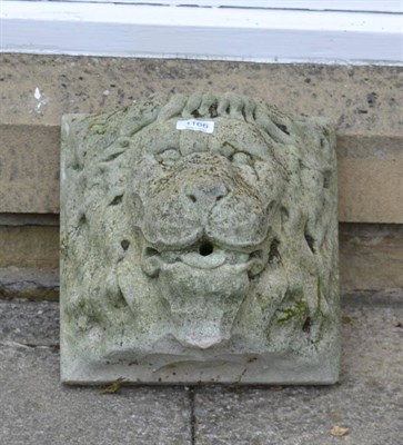 Lot 1166 - A composition lion fountain mask, 29cm square