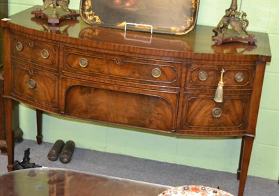 Lot 1179 - A 19th century mahogany bow fronted sideboard