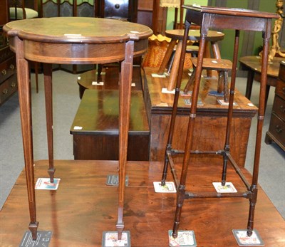 Lot 1206 - An Edwardian inlaid mahogany occasional table with shaped oval top and a mahogany plant stand...