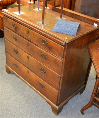 Lot 1215 - George III mahogany four height chest of drawers fitted with a baize lined dressing slide