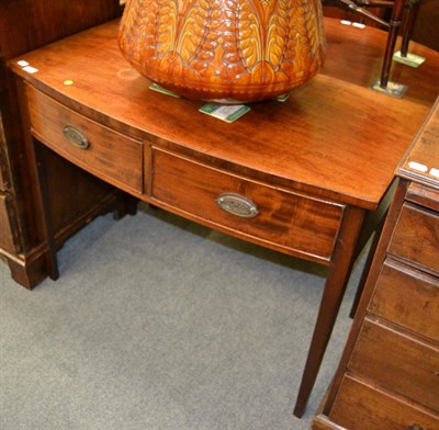 Lot 1216 - A 19th century mahogany bow fronted two drawer side table