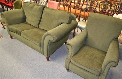 Lot 1241 - A modern green easy chair and sofa