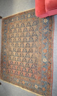 Lot 1243 - Turkmen rug, North Afghanistan, the claret field of Salor guls enclosed by indigo borders, 113...