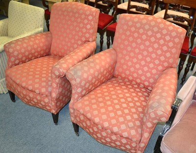 Lot 1246 - A pair of easy chairs on square tapered legs