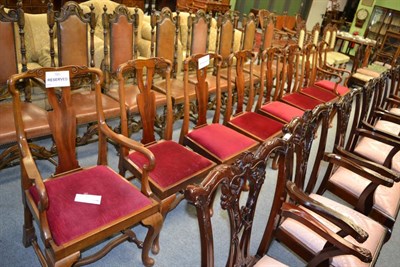 Lot 1251 - A set of eight walnut dining chairs in the 18th century style including two carvers