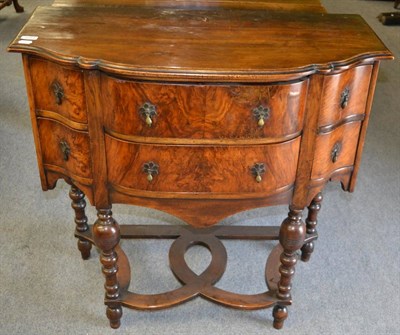 Lot 1254 - A small early 20th century bow fronted sideboard