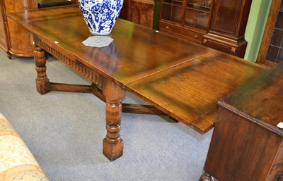 Lot 1255 - An oak draw leaf refectory dining table, in the Titchmarsh &amp; Goodwin taste