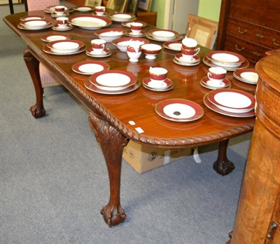 Lot 1257 - A Victorian mahogany extending dining table raised on bold ball and claw feet, with two leaves