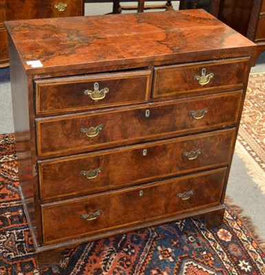 Lot 1260 - A small burr walnut four height chest of drawers