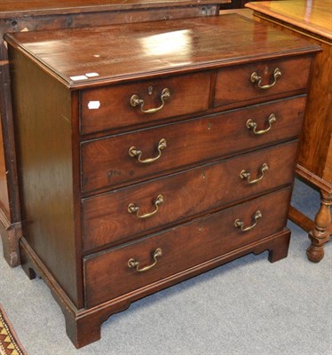 Lot 1272 - A George III mahogany four height chest of drawers of small proportions