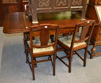 Lot 1287 - Table and four chairs