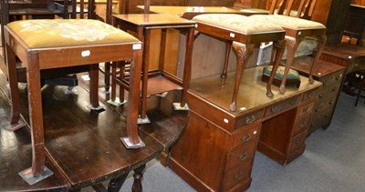 Lot 1289 - A pair of George III oak stools each with needlework drop-in seats and shell carved legs, nest...