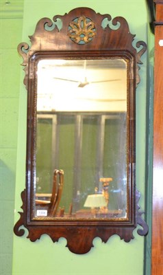 Lot 1304 - A George III mahogany fretwork mirror