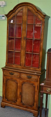 Lot 1305 - A reproduction bookcase cabinet