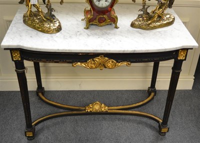 Lot 1313 - A marble top and ebonised table