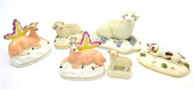 Lot 11 - Pair of 19th century porcelain deer, three Staffordshire sheep and a pointer dog (6)